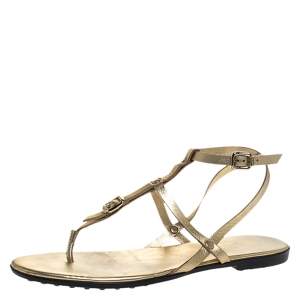 مملوكة مسبقًا Tod's Gold Leather Studded Buckle Detail Ankle Wrap Flat Sandals Size 38