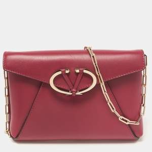 Pre Owned Valentino Dark Pink Leather V Rivet Clutch Bag