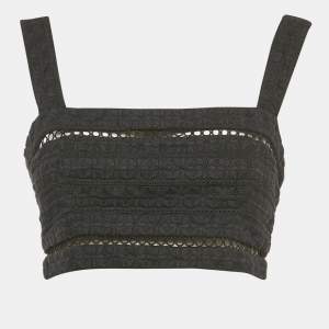 مملوكة مسبقًا ```json
{"name": "Zimmermann Black Embroidered Cotton Sleeveless Crop Top M", "name_ar": "توب زيمرمان قطن أسود مطرز بدون أكمام قصير مقاس متوسط (ميديوم)"}
```