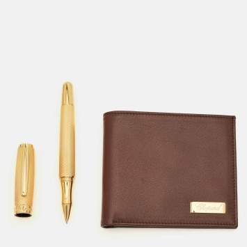 مملوكة مسبقًا محفظة شوپارد بطيّتين جلد بني مع طقم قلم حبر جاف