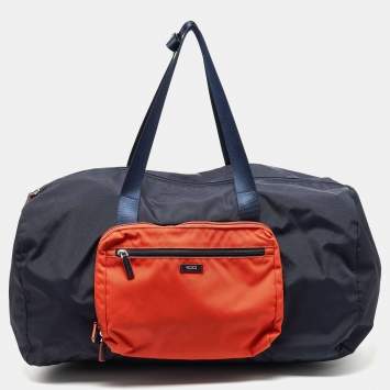 Pre Owned TUMI Navy Blue/Orange Nylon Foldable Compact Duffle Bag