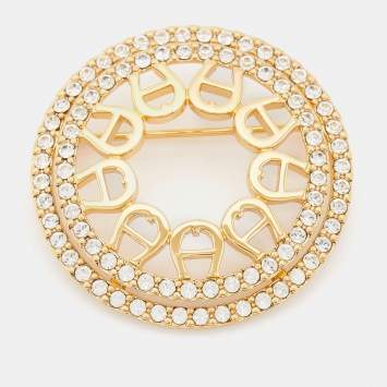Pre Owned Aigner Gold Tone Crystal Embellished Logo Round Brooch