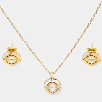 Pre Owned Aigner Gold Tone Mother of Pearl Crystal Logo Earring & Necklace Set