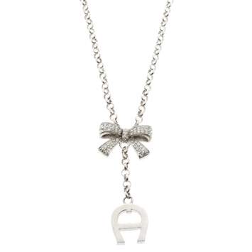 Pre Owned Aigner Crystal Studded Bow Silver Tone Long Toggle Necklace 