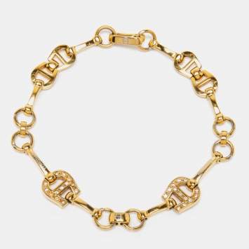 Pre Owned Aigner Gold Tone Crystal Logo Station Bracelet