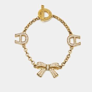 Pre Owned Aigner Bow Crystals Gold Tone Bracelet