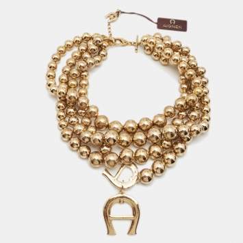 Pre Owned Aigner Bedazzled Crystal Gold Tone Multistrand Necklace