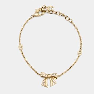 Pre Owned Aigner Bow Crystals Gold Tone Bracelet