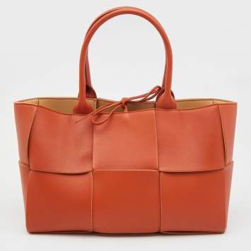 Pre Owned Bottega Veneta Orange Intrecciato Leather Arco Tote