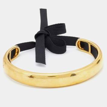 Pre Owned Carolina Herrera CH Gold Tone Ribbon Tie-Up Cuff Bracelet