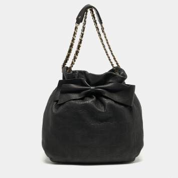 Pre Owned Carolina Herrera Bow Black Monogram Embossed Leather Bucket Bag
