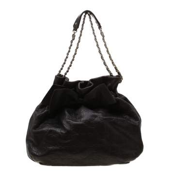 Pre Owned Carolina Herrera Dark Brown Monogram Embossed Leather Bow Bucket Shoulder Bag