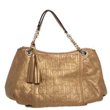 Pre Owned Carolina Herrera Golden Brown Monogram Embossed Leather Tassel Hobo
