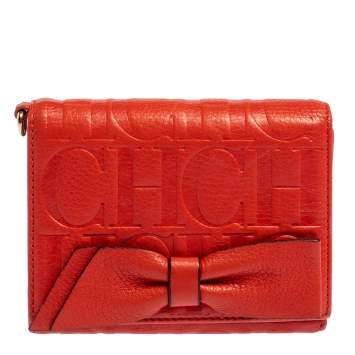 Pre Owned Carolina Herrera Orange Embossed Leather Bow Trifold Wallet