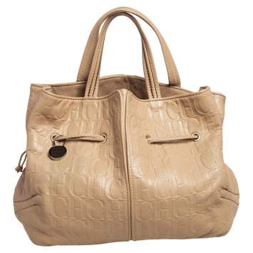 Pre Owned Carolina Herrera Beige Monogram Embossed Leather Drawstring Tote