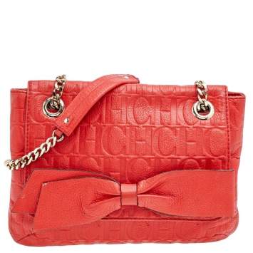 Pre Owned Carolina Herrera Orange Monogram Embossed Leather Bow Flap Shoulder Bag