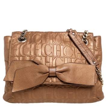 Pre Owned Carolina Herrera Metallic Gold Monogram Embossed Leather Bow Flap Shoulder Bag