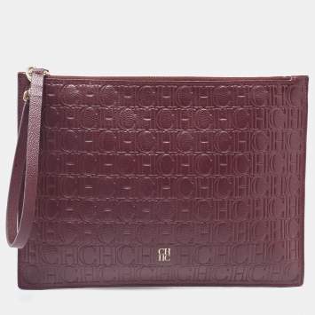 Pre Owned Carolina Herrera Burgundy Monogram Embossed Leather Zip Wristlet Pouch
