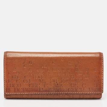 Pre Owned CH Carolina Herrera Brown Monogram Embossed Leather Trifold Continental Wallet