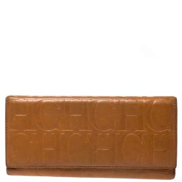 Pre Owned CH Carolina Herrera Mustard Monogram Embossed Leather Trifold Continental Wallet