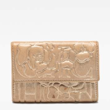 Pre Owned CH Carolina Herrera Gold Floral Embossed Leather Flap Compact Wallet