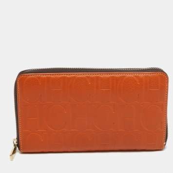 Pre Owned CH Carolina Herrera Orange Monogram Embossed Leather Zip Around Wallet