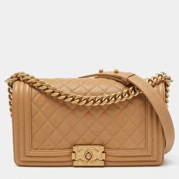 Pre Owned Chanel Beige Quilted Caviar Leather Medium Boy Flap Bag