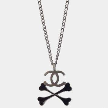 Pre Owned Chanel CC Crossbones Pendant Necklace Silver Black