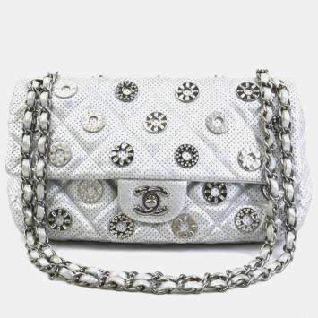 Pre Owned Chanel Silver Leather and Metal Rhinestone Paris-Dubai Perforated Eyelet Shoulder Bag