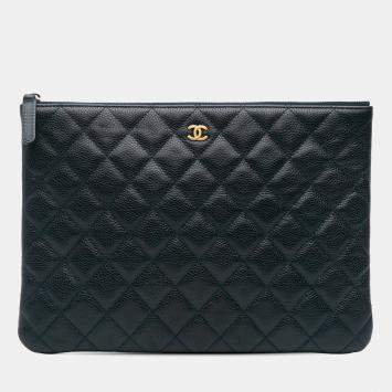 Pre Owned Chanel Navy Blue Medium Quilted Caviar O Case Clutch