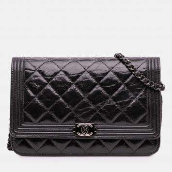 Pre Owned Chanel Black Quilted Shiny Aged Calfskin Boy Wallet On Chain