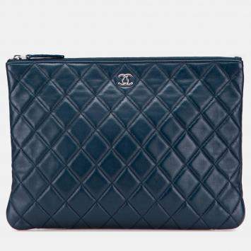 Pre Owned Chanel Blue Medium Quilted Lambskin O Case Clutch