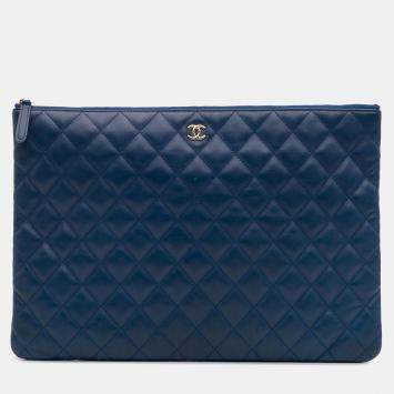 Pre Owned Chanel Blue Large Quilted Lambskin O Case Clutch