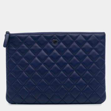 Pre Owned Chanel Blue Medium Quilted Lambskin O Case Clutch