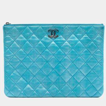 Pre Owned Chanel Blue Medium Quilted Iridescent Lambskin O Case Clutch