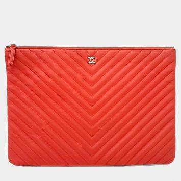 مملوكة مسبقًا Chanel Orange Leather Chevron Clutch Large