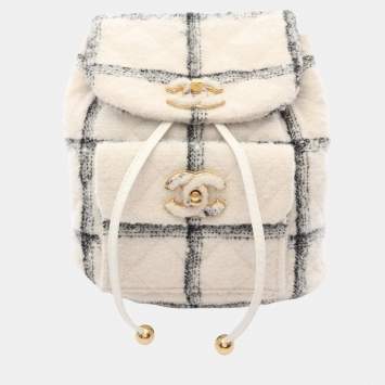 مملوكة مسبقًا حقيبة ظهر شانيل كو كو مارك قماش أبيض أسود