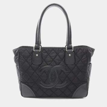 مملوكة مسبقًا حقيبة شانيل باريس-نيويورك كبيرة من النايلون والجلد باللون الأسود