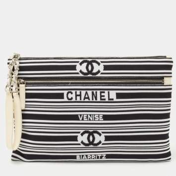Pre Owned Chanel Black/White Stripe Fabric and Leather Zip Wristlet Clutch