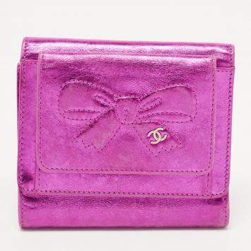 Pre Owned Chanel Metallic Pink Leather Ribbon Embossed Trifold Wallet