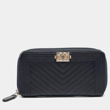 Pre Owned Chanel Dark Blue Chevron Leather Boy Zip Around Wallet