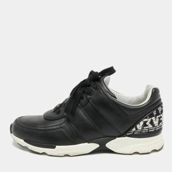 مملوكة مسبقًا حذاء رياضي شانيل جلد أسود/أبيض سي سي برباط مقاس 39