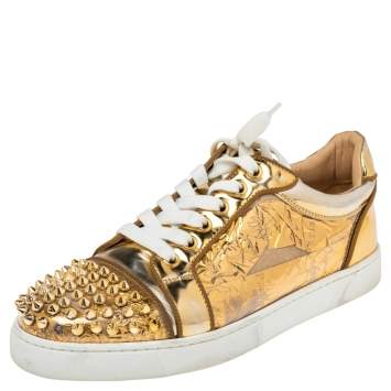 Pre Owned Christian Louboutin Gold PVC and Leather Spiked Orlato Low Top Sneakers 38.5