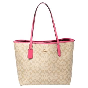 Pre Owned Coach Beige/Pink Signature Coated Canvas and Leather City Tote