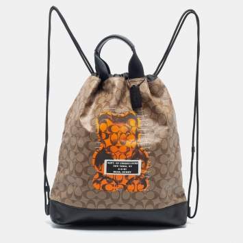 Pre Owned Coach Brown/Black Leather And Signature Coated Canvas City Backpack