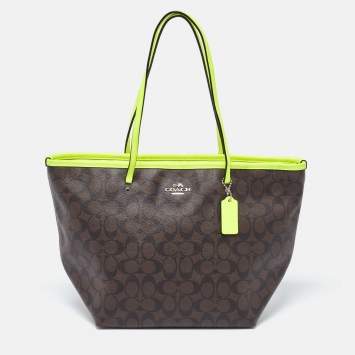 Pre Owned Coach Green/Brown Signature Coated Canvas and Leather Street Zip Tote