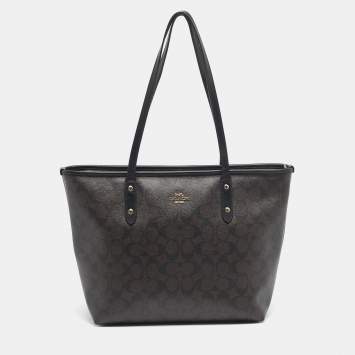 Pre Owned Coach Black/Dark Brown Signature Coated Canvas and Leather City Zip Tote