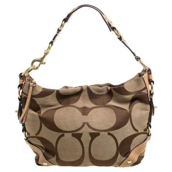 Pre Owned Coach Beige Signature Canvas and Leather Carly Hobo
