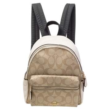 Pre Owned Coach Beige/Cream Signature Coated Canvas And Leather Mini Charlie Backpack