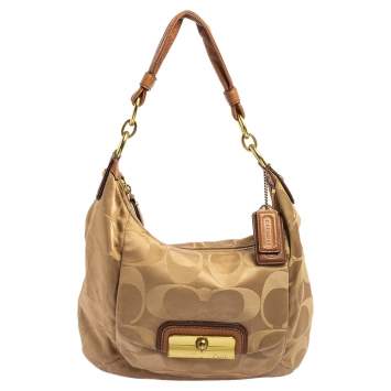 Pre Owned Coach Beige Signature Canvas and Leather Kristin Hobo